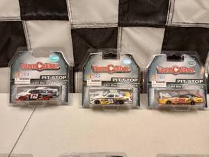 lot 934 image: Team Caliber Pit Stop 164th Scale Die Cast Cars