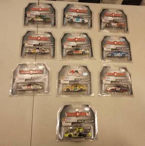 lot 943 image: Team Caliber Pit Stop 164th Scale Die Cast Cars
