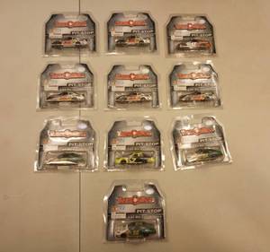 lot 947 image: Team Caliber Pit Stop 164th Scale Die Cast Cars