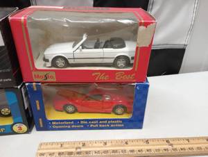 lot 1051 image: (8) 143 Scale Maisto, Race Image & Other assorted Cars