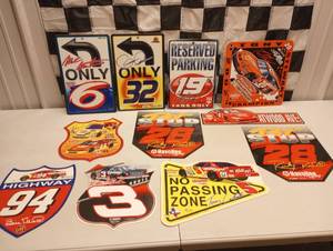 lot 1066 image: (11) Assorted Nascar Vinal Wall Signs