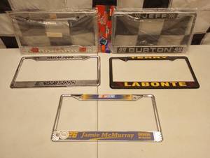 lot 1080 image: (5) Metal Nascar license Plate Topper