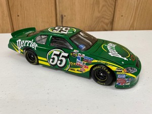 lot 1105 image: Action Movie Paint Scheme Jean Girard #55 Perrier  Talladega Nights 124th Scale Die Cast Car