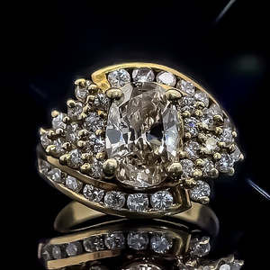 Glamorous 2.56 Carat Large Oval Diamond and Cluster Diamond Bypass Ring in 18k Yellow Gold $4,999 Retail