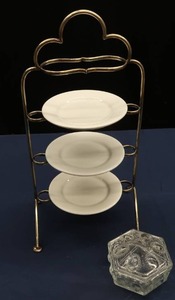 lot 7 image: 3 TIER HOLDER WITH 3 CHINA PLATES WITH A GLASS DISH WITH LID
