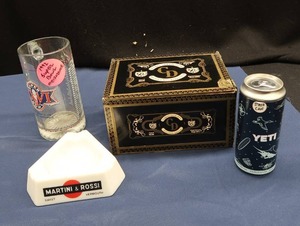 lot 14 image: VIMNTAGE CIGAR BOXMUGASHTRAY AND YETI CAN LOT OF 4