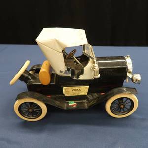 lot 16 image:  RARE VINTAGE VODKA BOTTLE OLD FASHIONED CAR