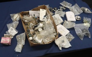 lot 64 image: BOLTS, CHECK VALVES, AND MORE