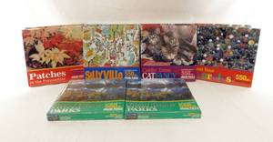 lot 24 image: Lot of 10 According to Hoyle 550 Piece Jigsaw Puzzles