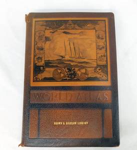 lot 64 image: 1943 Word Atlas Leather Bound Book with Library Card SIGNED by Artist Stanford Fenelle