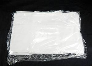 lot 96 image: Lot of 65 New White Commercial Sous Chef Adjustable Kitchen Aprons
