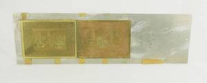 lot 31 image: Two Holiday Scene Brass Embossing Plates Mounted on Single Metal Plate