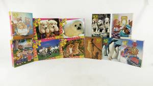 lot 123 image: Lot of 11 Vintage 1990s According to Hoyle Crown for Kids 63 Piece Jigsaw Puzzles