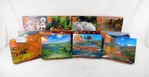 lot 124 image: Lot of 12 According to Hoyle 1000 Piece Jigsaw Puzzles