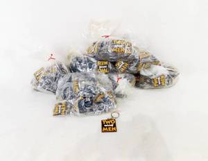 lot 138 image: Lot of 300 Two and a Half Men Keychains