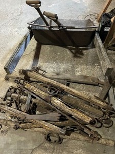 Tumble Bug old yard tools  and multiple horse eveners great yard art