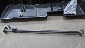 Under Seat Storage Tray and Load Lock Bar