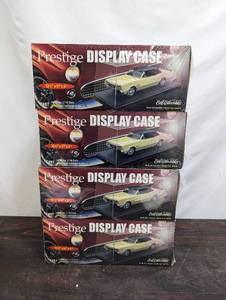 Four Model Car Display Cases