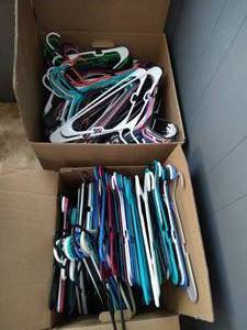 lot 21 image: (2) Large Boxes Of Plastic Hangers