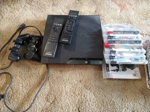 lot 24 image: PS3 With Remotes And Games