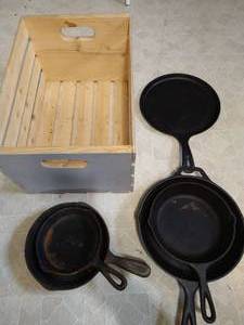 lot 34 image: Cast Iron Skillets, Tortilla Pan, & Crate
