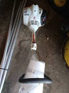 lot 112 image: Stihl Weed Trimmer With Manual