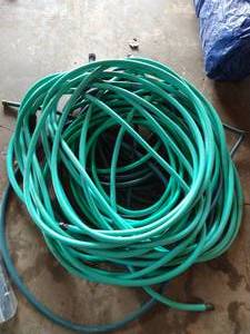 lot 113 image: Pile Garden Hoses