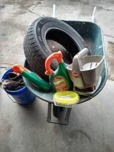 lot 144 image: Wheelbarrow, Dirt, Seeder, Tire, Weed Barrier, Etc.