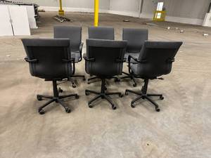 Six Matching Adjustable Chairs with wheels