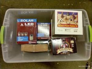 lot 35 image: Christmas Decor - Solar Lights (New In Box) & Nut Cracker