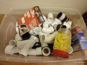 lot 50 image: Tub Of PVC, Tape, & Rope Caulk