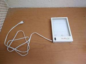 lot 101 image: Caribbean Sun LED Light Therapy