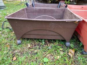 lot 105 image: (4) Rectangular Self-Watering Rolling Planters