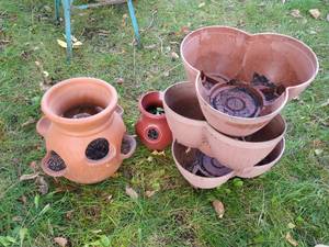 lot 114 image: Terra Cotta Planter, Plastic Planter, & 3-Tiered Plastic Planter