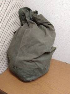 lot 158 image: Military Duffel With Camo Shirts & Pants
