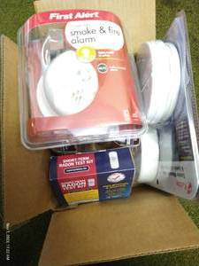 lot 203 image: Radon Test Kits, Smoke Alarms, And Carbon Monoxide Detectors - All Items New In Box