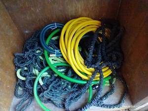 lot 429 image: Bottom Shelf Full Of Hoses - Collapsible & Rubber