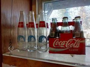 lot 432 image: (6) North Dakota Centennial Coke Bottles And Set Of 96 Olympics Coke Bottles