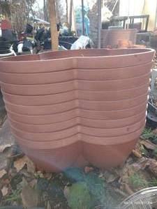 lot 480 image: (9) Stackable Strawberry Planters