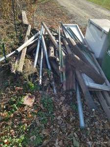 lot 507 image: Scrap Lot Of Metal Fence Posts, Pipes, Wood Posts, And Railroad Ties