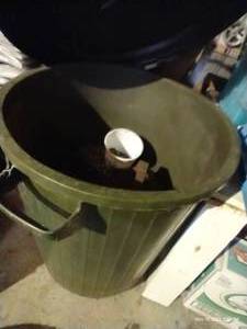 lot 566 image: Garden Trash Can With Potting Soil