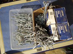 lot 585 image: (2) Boxes Of Pegboard Hooks And Some Chain