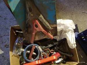 lot 594 image: Box Of Jumper Cable Clamps, Insulators, And Other Misc. Tools And Hardware