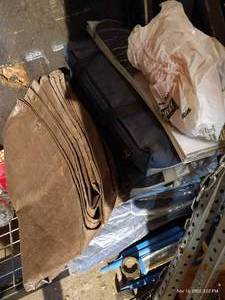 lot 598 image: Stack Of Tarps And Furniture Blankets