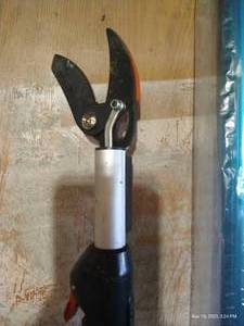 lot 610 image: Extension Branch Trimmer, Roof Coater Brush With Squeegee, And Other Misc. Tools