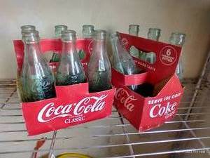 lot 653 image: Coke Bottles