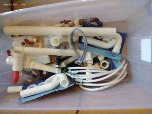 lot 660 image: Tote of PVC Pipe, Plumbing Parts, Etc. NEW