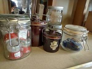 lot 692 image: Small Crocks & Jars 2Lids