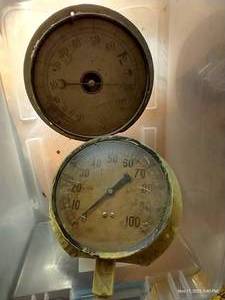 lot 702 image: Two Vintage Metal Gauges