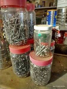 lot 771 image: Seven Jars of Rivets